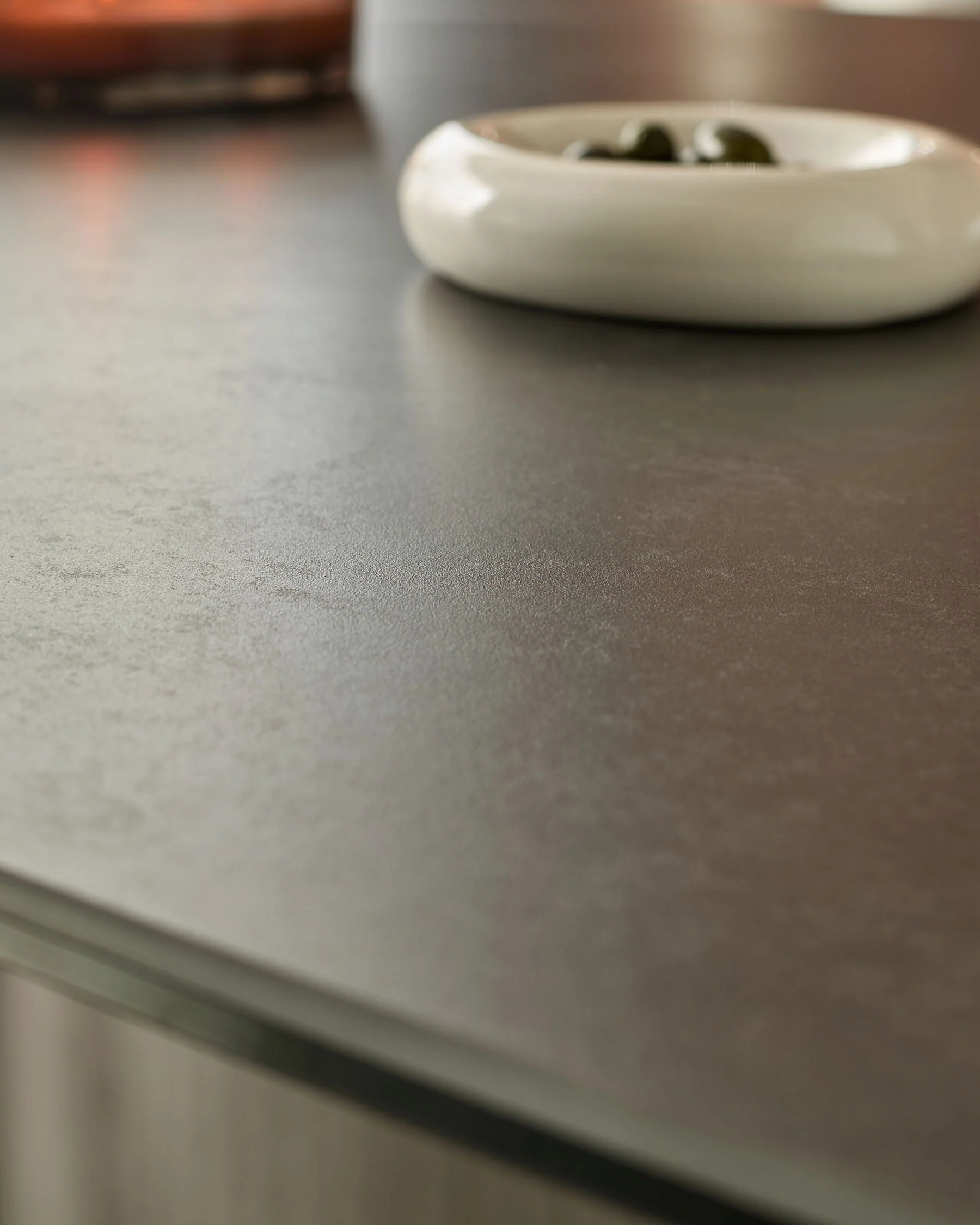 Carlo dark grey ceramic with ombre metal 8 seater dining table - Image 6