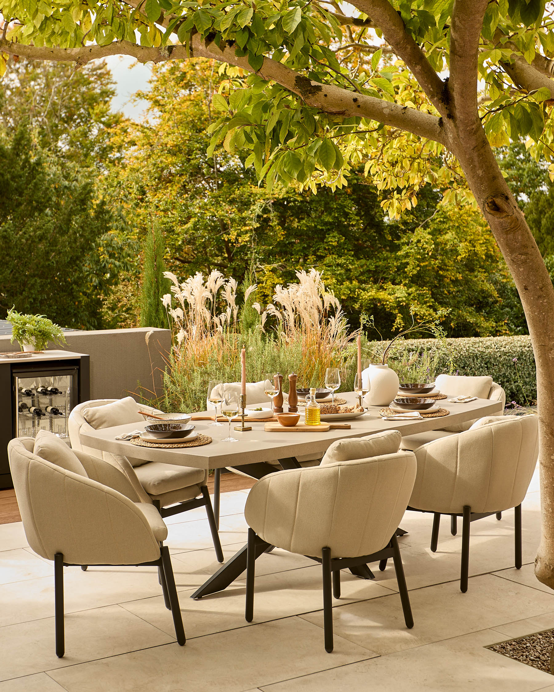 Donato dark grey garden dining table with 6 Camilo natural dining chairs set