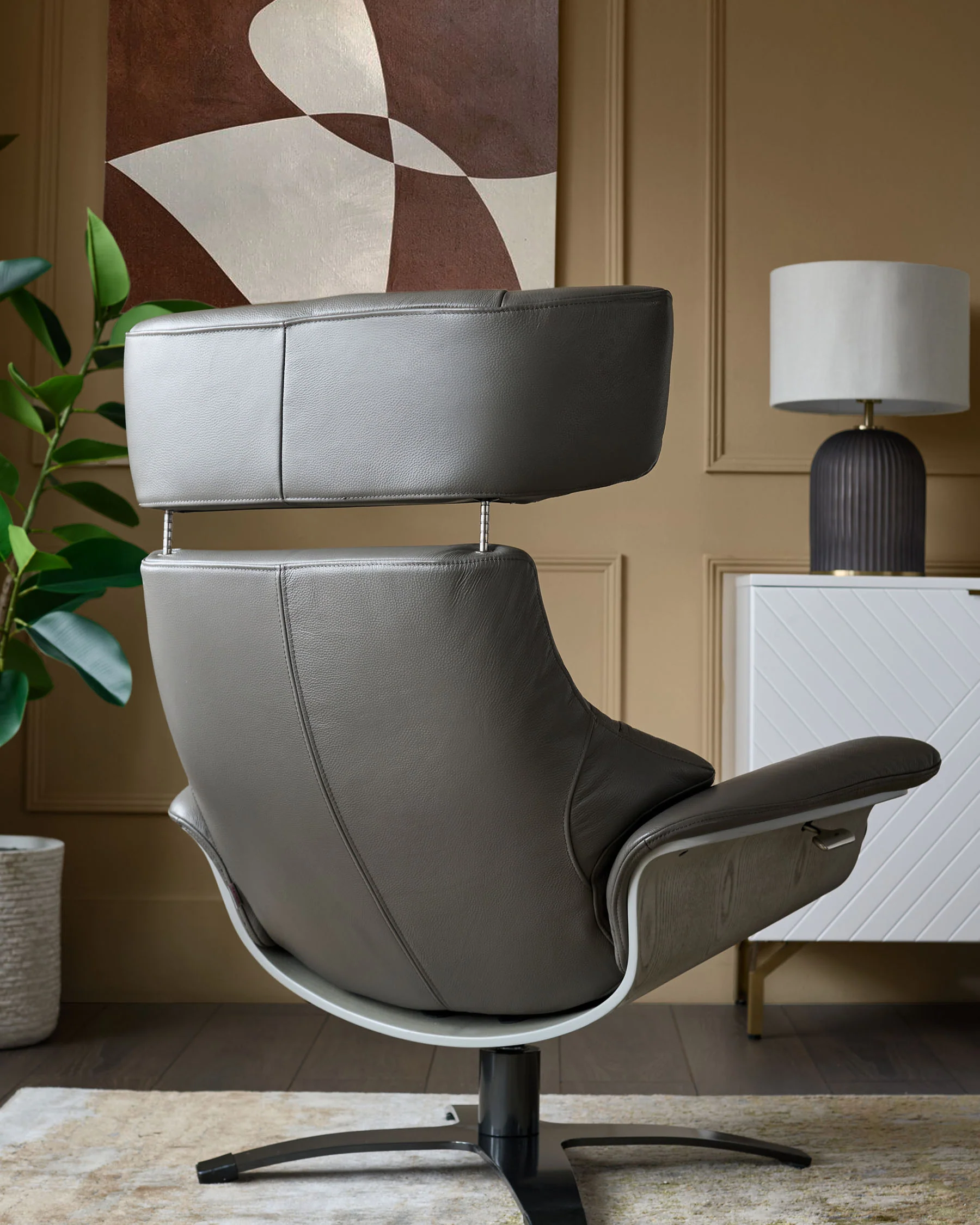 Karma dark grey leather swivel recliner accent chair and footstool - Image 6