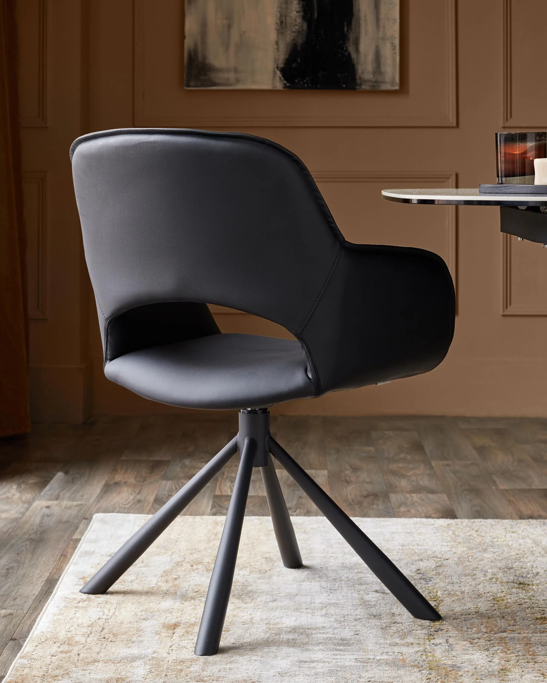 Marlow black faux leather swivel dining chair - Image 4