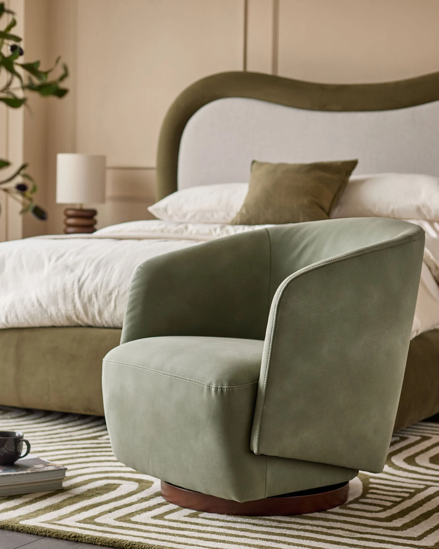 Natalia sage green faux leather swivel accent chair