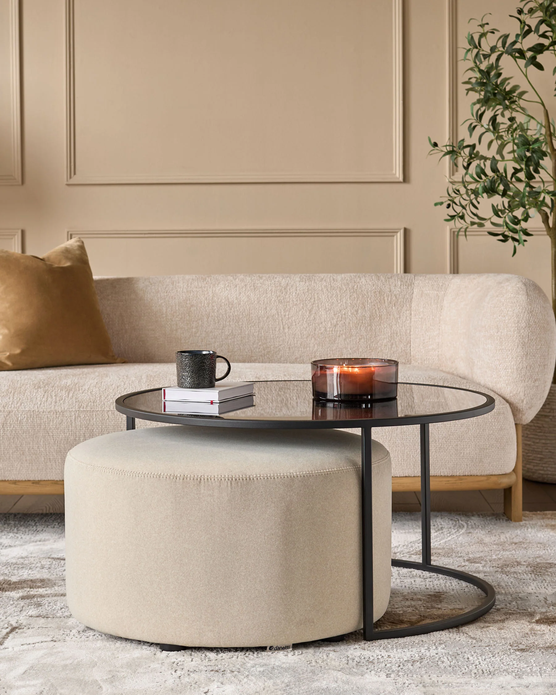 Thea smoked mirror coffee table and cream plush fabric pouffe set